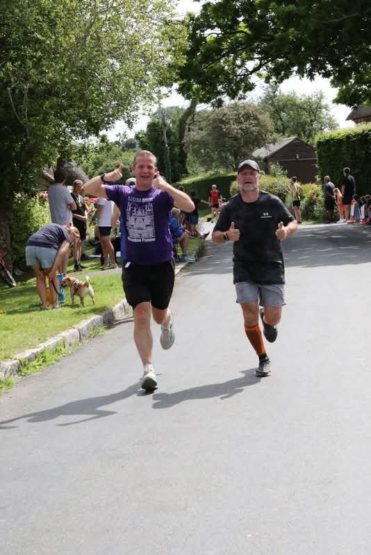 James and John finishing the Coombe Keynes 10k.